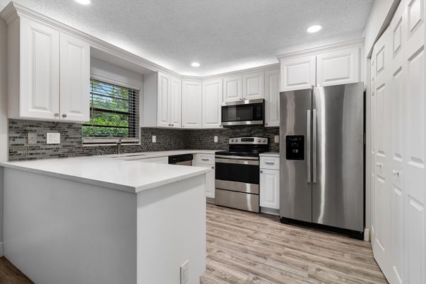 Interior, Kitchen, Recessed Lighting, Stainless Steel Appliances, Wood Texture Flooring