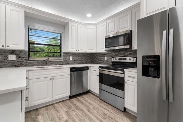Interior, Kitchen, Recessed Lighting, Stainless Steel Appliances, Wood Texture Flooring
