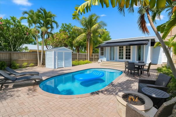 Exterior, Pool, Solar Panels