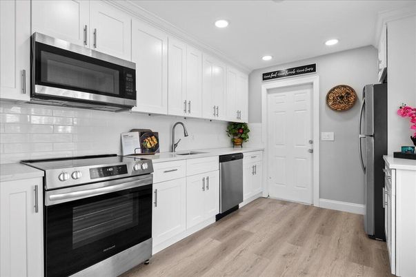 Interior, Kitchen, Recessed Lighting, Stainless Steel Appliances, Wood Texture Flooring
