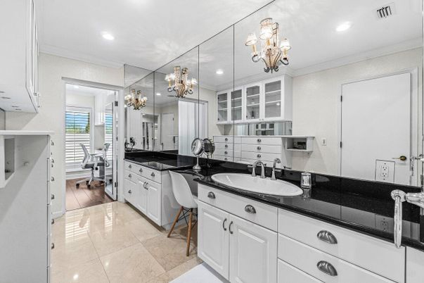 Bathroom, Chandelier, Dual Sink Vanities, Interior, Recessed Lighting, Wood Texture Flooring