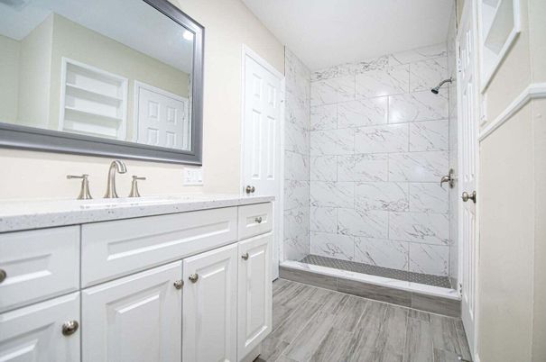 Bathroom, Glass Shower, Interior, Marble Walls, Wood Texture Flooring