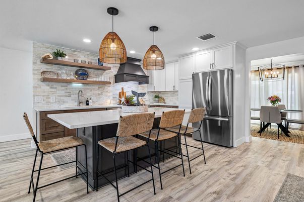 Dining room, Interior, Kitchen, Pendant Lights, Recessed Lighting, Stainless Steel Appliances, Stone Walls, Wood Texture Flooring