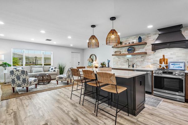 Interior, Kitchen, Living room, Pendant Lights, Recessed Lighting, Stainless Steel Appliances, Stone Walls, Wood Texture Flooring