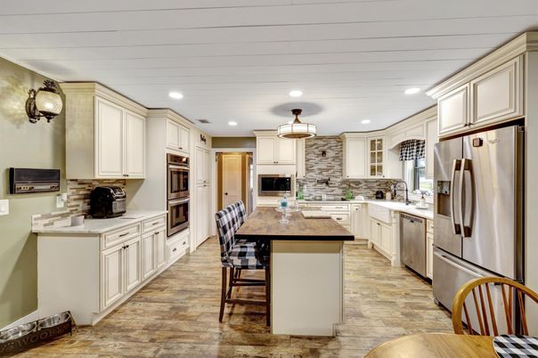 Dining room, Interior, Kitchen, Pendant Lights, Recessed Lighting, Stainless Steel Appliances, Wood Texture Flooring