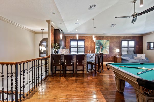Billiard Table, Game Room, Interior, Pendant Lights, Recessed Lighting, Stone Walls, Wood Texture Flooring