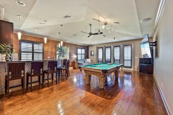 Billiard Table, Game Room, Interior, Pendant Lights, Recessed Lighting, Stone Walls, Wood Texture Flooring