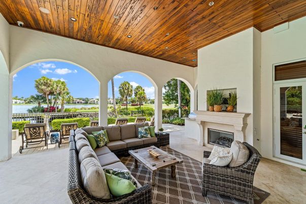 Exterior, Fireplace, Living room, Recessed Lighting, Water, Wooden Ceilings