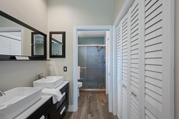 Bathroom, Dual Sink Vanities, Glass Shower, Interior, Wood Texture Flooring
