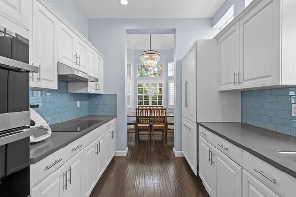 Chandelier, Dining room, Interior, Kitchen, Recessed Lighting, Stainless Steel Appliances, Wood Texture Flooring