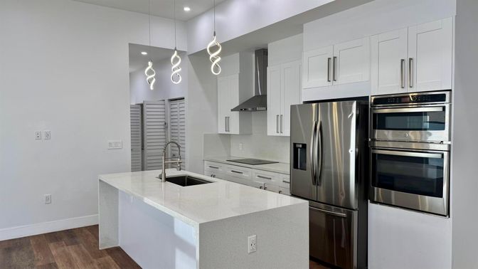 Interior, Kitchen, Pendant Lights, Recessed Lighting, Stainless Steel Appliances, Wood Texture Flooring