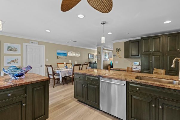 Dining room, Interior, Kitchen, Pendant Lights, Recessed Lighting, Stainless Steel Appliances, Wood Texture Flooring