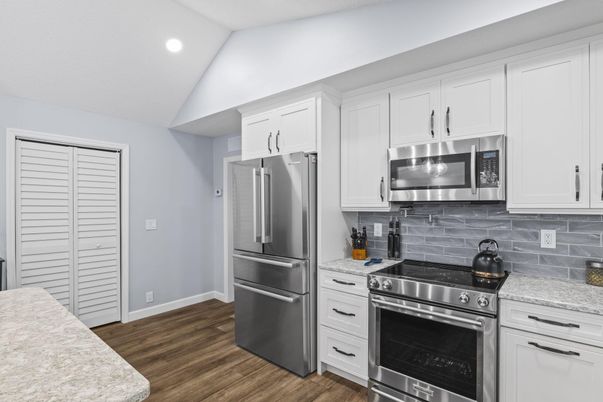Interior, Kitchen, Recessed Lighting, Stainless Steel Appliances, Wood Texture Flooring