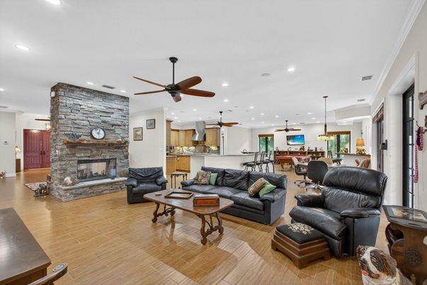 Dining room, Fireplace, Interior, Kitchen, Living room, Pendant Lights, Recessed Lighting, Stone Walls, Wood Texture Flooring