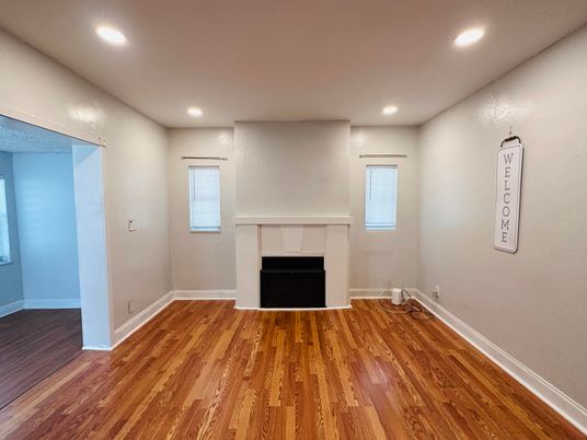 Empty room, Fireplace, Interior, Recessed Lighting, Wood Texture Flooring