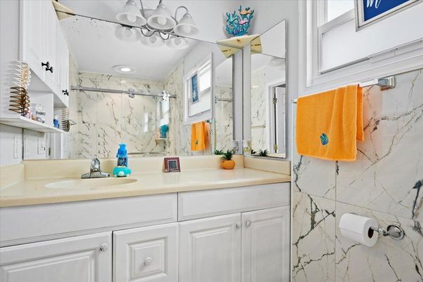 Bathroom, Dual Sink Vanities, Interior, Marble Walls, Recessed Lighting