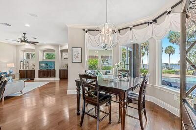 Chandelier, Dining room, Interior, Living room, Recessed Lighting, Water, Wood Texture Flooring