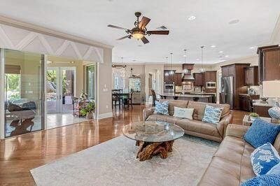 Dining room, Interior, Kitchen, Living room, Pendant Lights, Recessed Lighting, Stainless Steel Appliances, Wood Texture Flooring