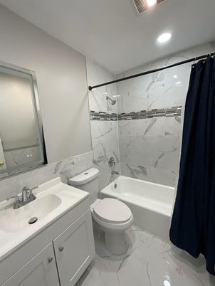 Bathroom, Dual Sink Vanities, Interior, Marble, Marble Walls, Recessed Lighting