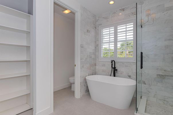 Bathroom, Free Standing Baths, Glass Shower, Interior, Marble Walls, Recessed Lighting