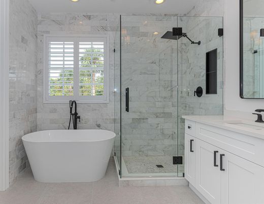 Bathroom, Free Standing Baths, Glass Shower, Interior, Marble Walls, Recessed Lighting