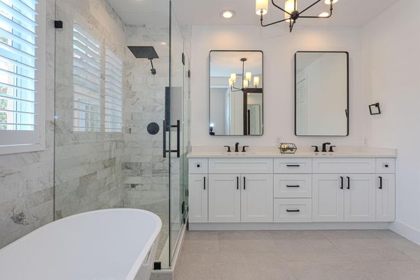 Bathroom, Dual Sink Vanities, Free Standing Baths, Glass Shower, Interior, Marble Walls, Pendant Lights, Recessed Lighting
