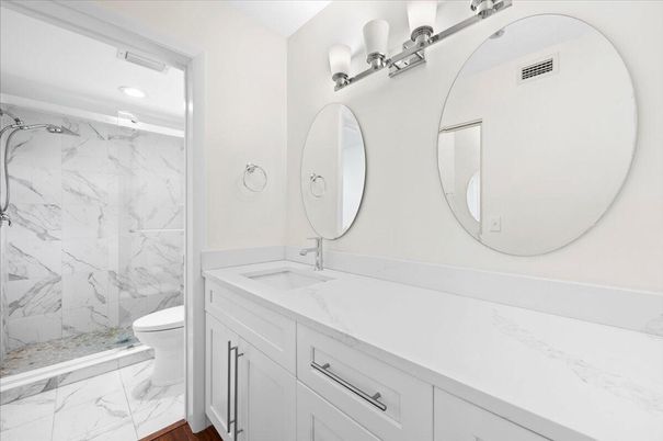 Bathroom, Dual Sink Vanities, Interior, Marble, Marble Walls, Recessed Lighting