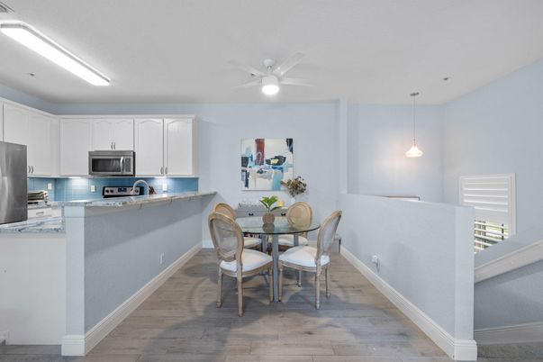 Dining room, Interior, Kitchen, Pendant Lights, Stainless Steel Appliances, Wood Texture Flooring