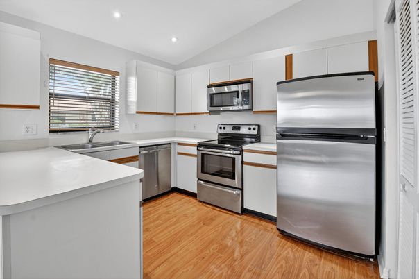 Interior, Kitchen, Recessed Lighting, Stainless Steel Appliances, Wood Texture Flooring