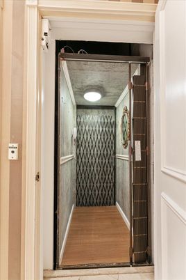 Elevator, Interior, Recessed Lighting, Wood Texture Flooring