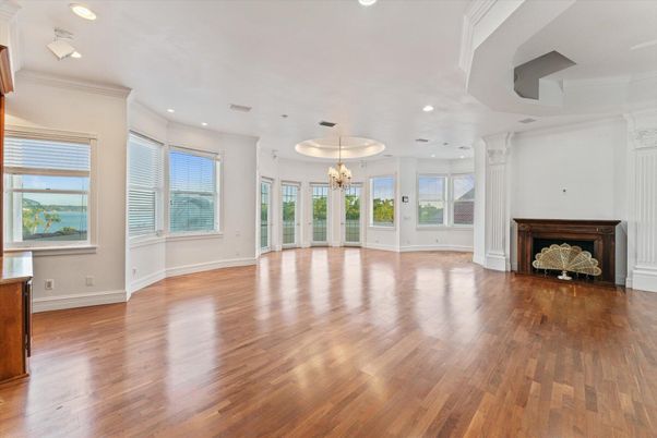 Chandelier, Empty room, Fireplace, Interior, Recessed Lighting, Wood Texture Flooring