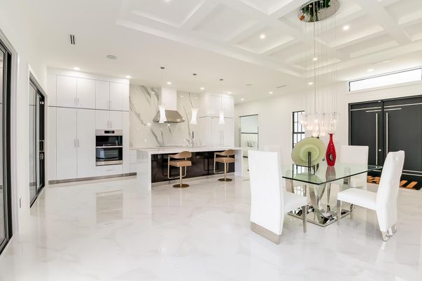 Dining room, Interior, Kitchen, Marble, Marble Walls, Pendant Lights, Recessed Lighting, Stainless Steel Appliances