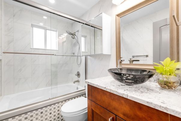 Bathroom, Glass Shower, Interior, Marble Walls, Recessed Lighting, Tile Countertops
