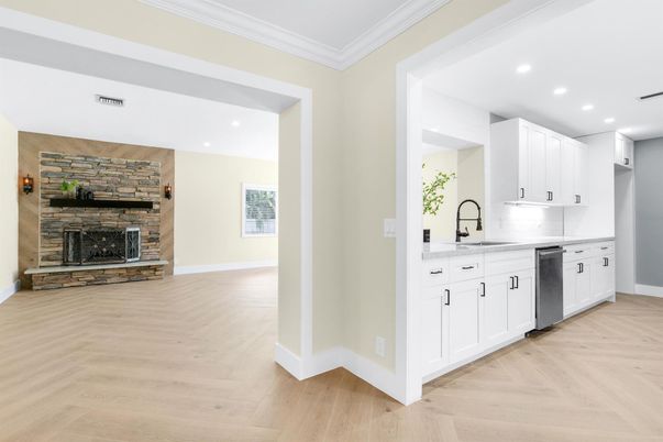 Fireplace, Interior, Kitchen, Recessed Lighting, Stone Walls, Wood Texture Flooring