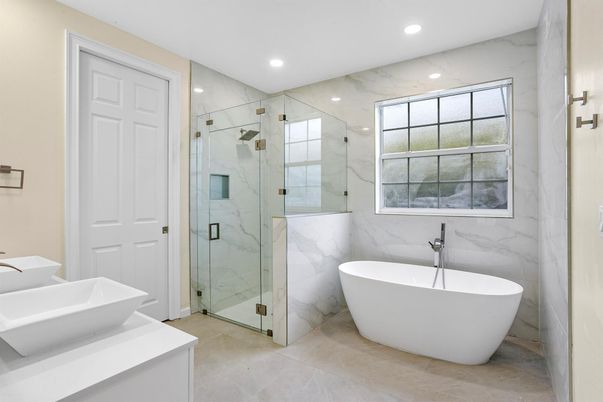 Bathroom, Free Standing Baths, Glass Shower, Interior, Marble Walls, Recessed Lighting