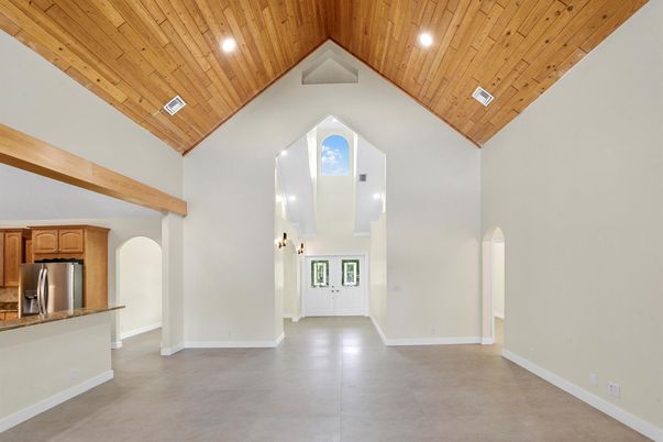 Empty room, Interior, Kitchen, Recessed Lighting, Stainless Steel Appliances, Wooden Beams, Wooden Ceilings