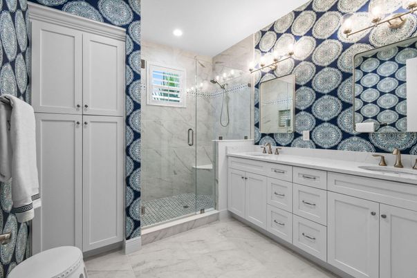 Bathroom, Dual Sink Vanities, Glass Shower, Interior, Marble, Marble Walls, Recessed Lighting