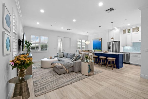 Chandelier, Dining room, Interior, Kitchen, Living room, Pendant Lights, Recessed Lighting, Stainless Steel Appliances, Wood Texture Flooring