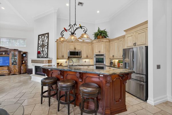 Chandelier, Fireplace, Interior, Kitchen, Recessed Lighting, Stainless Steel Appliances