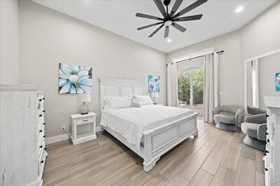 Bedroom, Fireplace, Interior, Recessed Lighting, Wood Texture Flooring