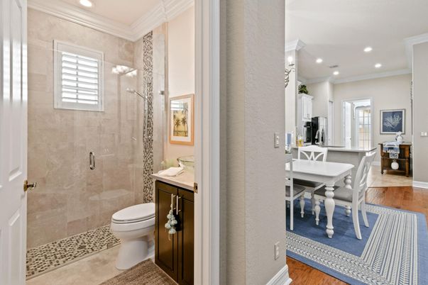 Bathroom, Dining room, Glass Shower, Interior, Recessed Lighting, Wood Texture Flooring