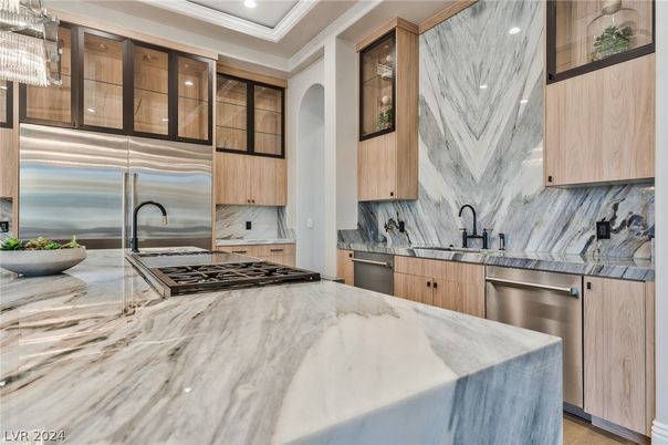 Interior, Kitchen, Marble Walls, Recessed Lighting, Stainless Steel Appliances