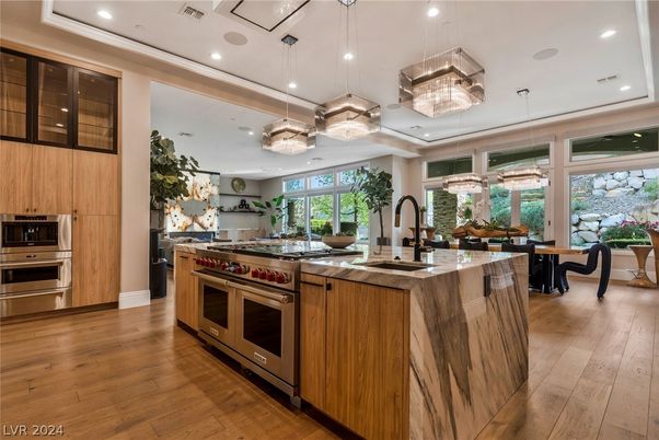 Dining room, Interior, Kitchen, Pendant Lights, Recessed Lighting, Stainless Steel Appliances, Wood Texture Flooring