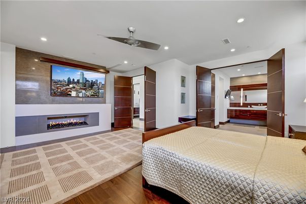 Bedroom, Fireplace, Interior, Recessed Lighting, Wood Texture Flooring