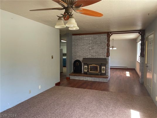 Empty room, Fireplace, Interior, Pendant Lights, Stone Walls, Wood Texture Flooring