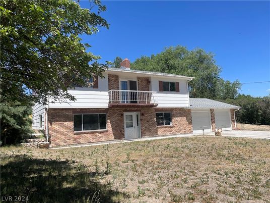 Attached, Backyard, Exterior, Facade, Brick Facade, Raised Ranch
