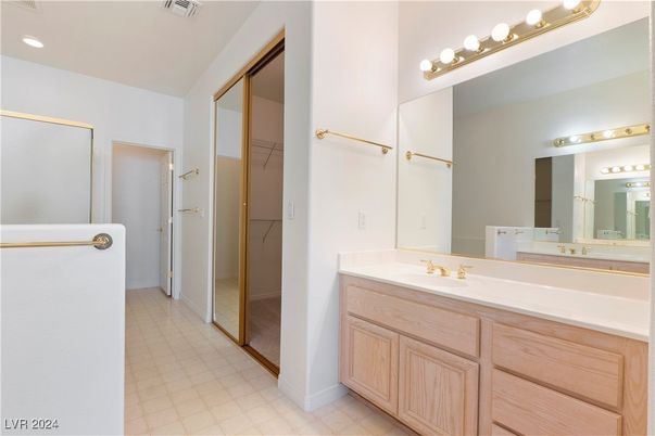 Bathroom, Dual Sink Vanities, Interior, Recessed Lighting, Walk-in Closets