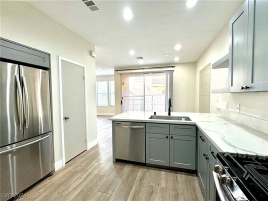 Interior, Kitchen, Recessed Lighting, Stainless Steel Appliances, Wood Texture Flooring