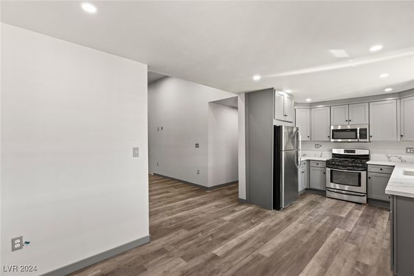 Interior, Kitchen, Recessed Lighting, Stainless Steel Appliances, Wood Texture Flooring