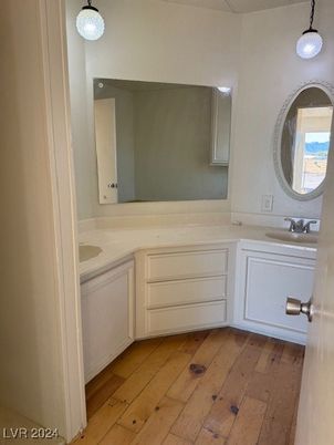 Bathroom, Dual Sink Vanities, Interior, Pendant Lights, Wood Texture Flooring